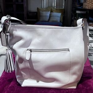 Coach Legacy Duffle Bag 19888. Off white. Preowned. Leather with tassels.